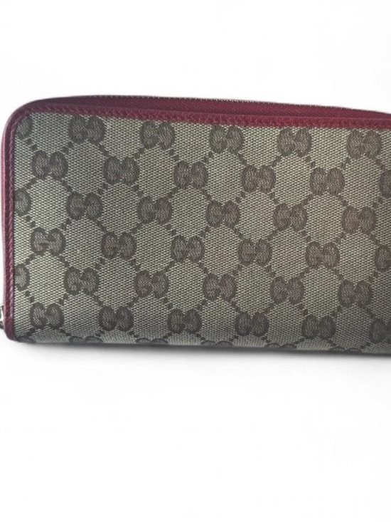 Gucci Handbags - Gucci GG Zip Around Wallet With Red Trim
